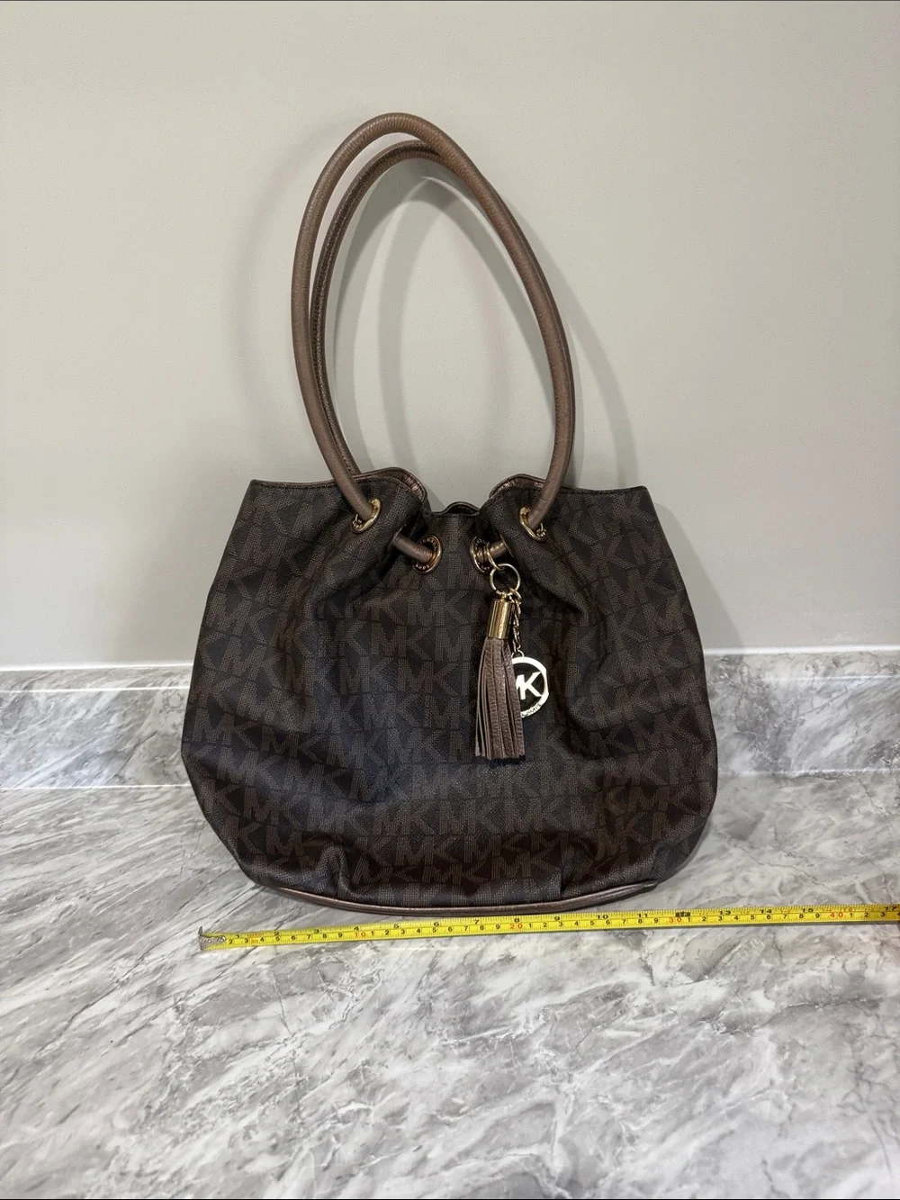 Michael Kors Brown Logo Drawstring Shoulder Bag with Tassel Charm